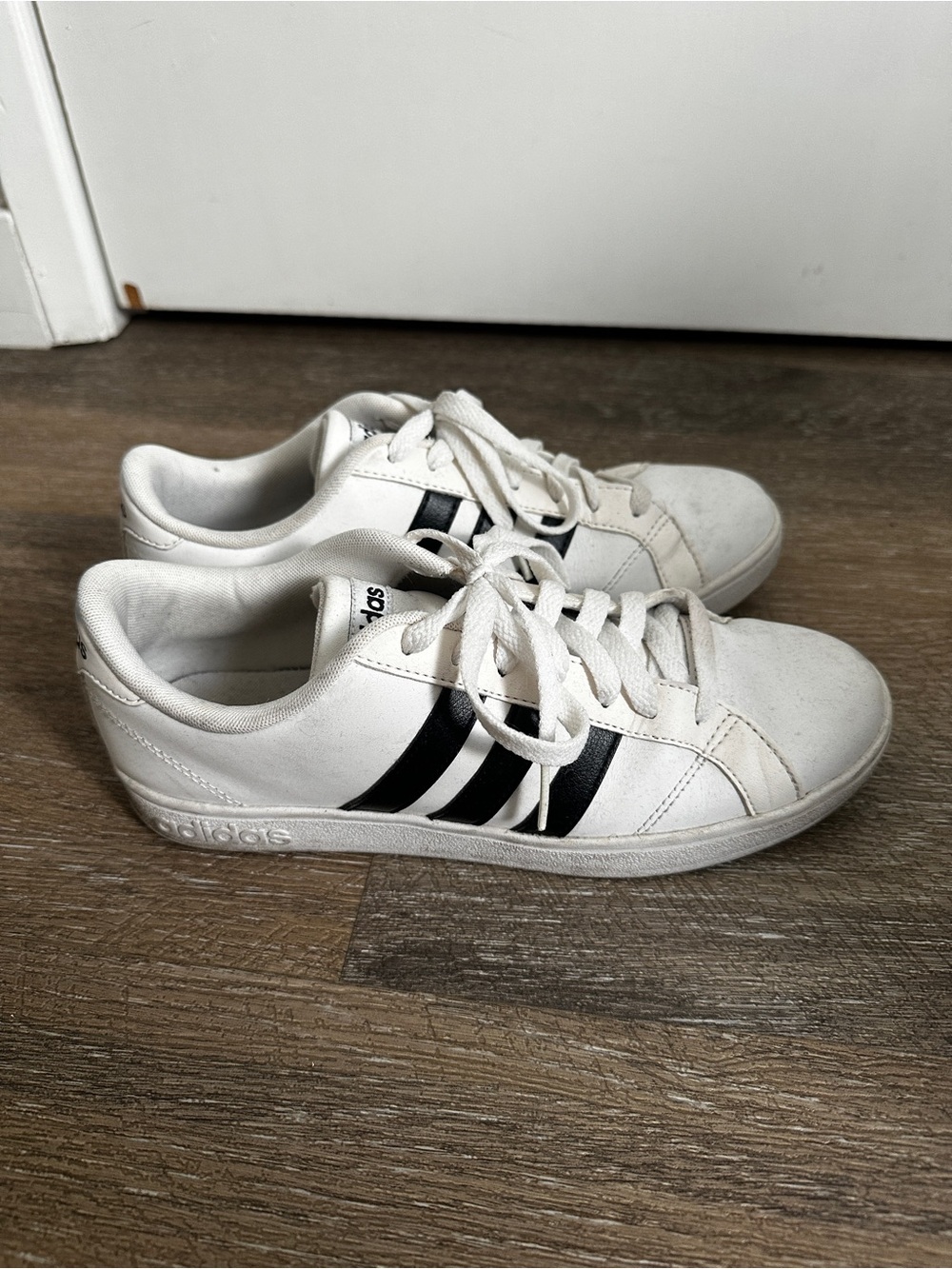 Adidas White Sneakers with Black Three-Stripes